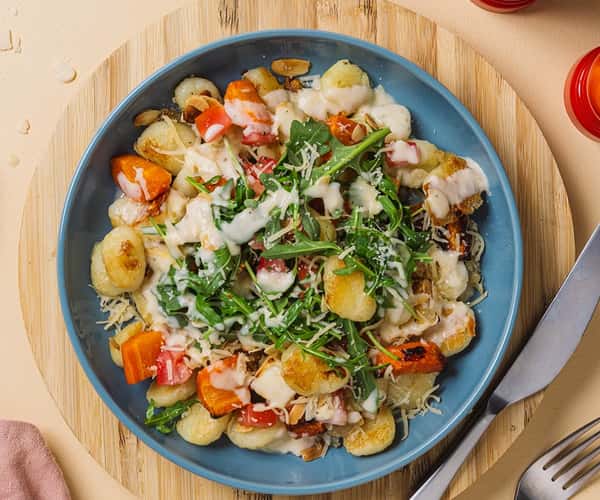 Sprøstekt gnocchi med ovnsbakte rotgrønnsaker og urtesaus