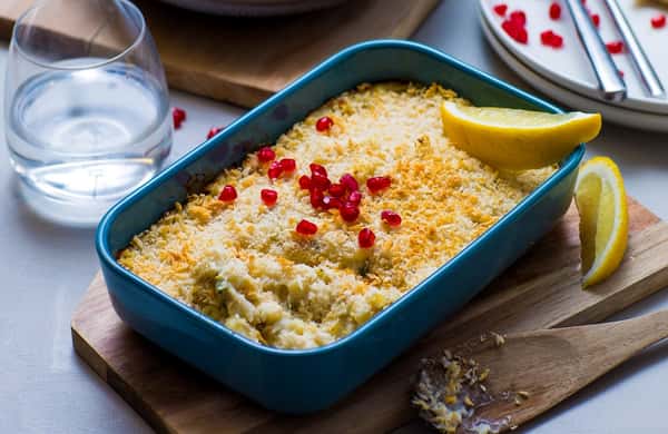 Fiskegrateng og råkostsalat med appelsin og granateple
