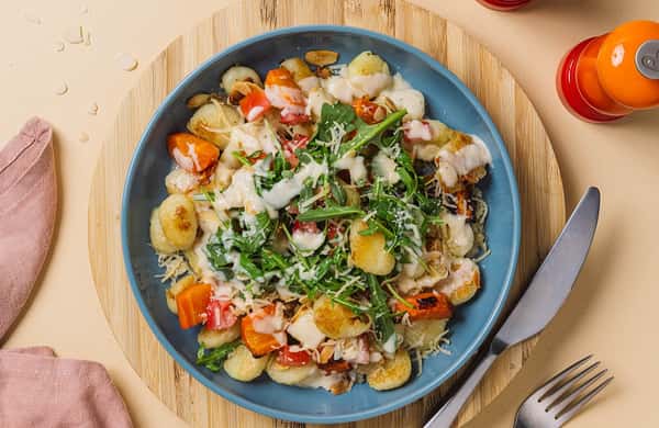 Sprøstekt gnocchi med ovnsbakte rotgrønnsaker og urtesaus